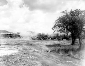 Photo:  155-mm howitzers of the 82nd Field Artillery Battalion, 1st Cavalry Division, made the Communist keep their distance.