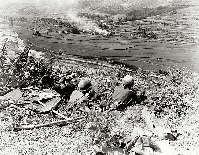 Infantry firing positions overlooking flat terrain