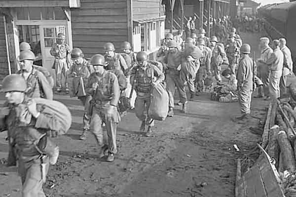 1st Units of doomed Task Force Smith enter Taejon