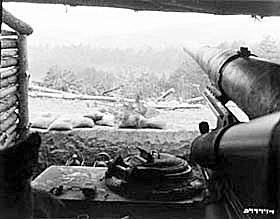 Photo:  Communist-held territory from the hillside position of an eight-inch self propelled howitzer on Hill #857.