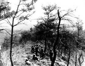 Photo:  Men of Company "A", 31st Infantry Regiment, 7th U.S. Infantry Division, fire from 57-mm recoilless rifles and .30 caliber machine guns.