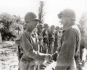 Major General Hobart R. Gay, CG, 1st Cavalry Division, congratulates 2nd Lieutenant Raymond A. Whelan of Mossap, Conn., after awarding him the Silver Star for meritorious services.