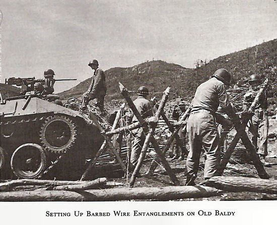 Setting Up Barbed Wire Entanglements on Old Baldy 