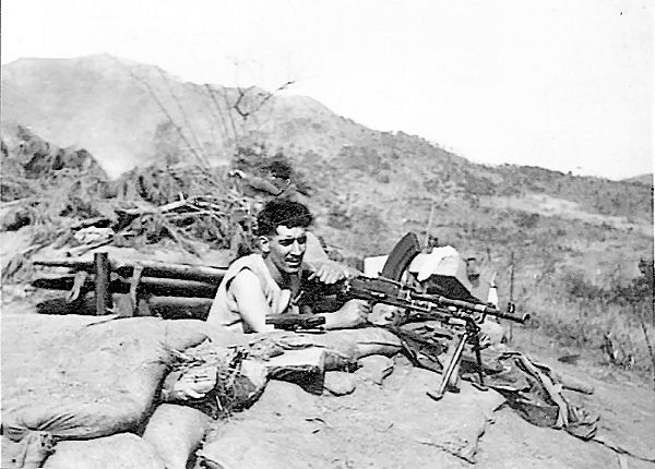 Vince Gilligan under mortar fire on Hill 355 gun position